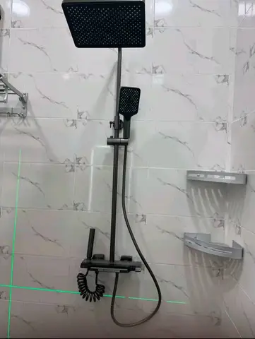 Bathroom with LED mirror and rain shower — 5