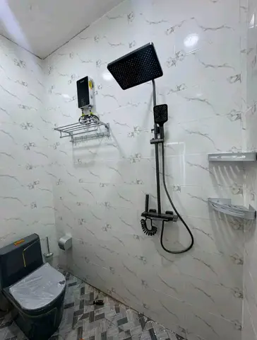 Bathroom with LED mirror and rain shower — 6