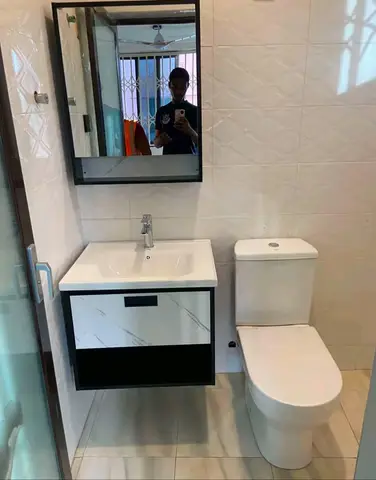 Bathrooms with black-and-white vanity units — 4