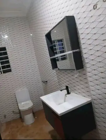 Bathroom with white 3D wall tiles — 2