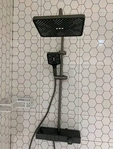 Beige bathroom with black thermostatic shower — 5