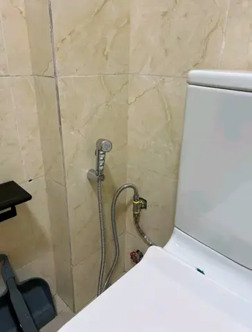 Beige bathroom with black thermostatic shower — 6