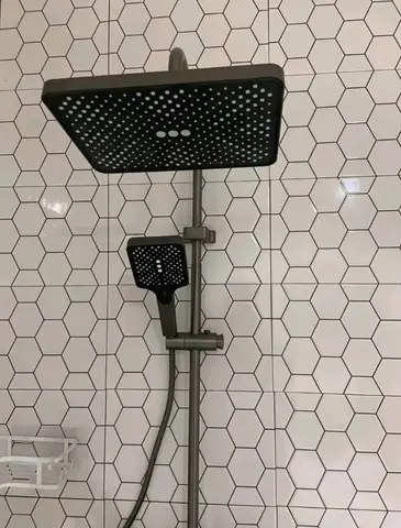 Beige bathroom with black thermostatic shower — 7